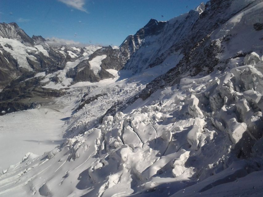 Alpine Majesty: Bern to Jungfraujoch Exclusive Private Tour - Outdoor Deck Time: How to Use the Unobstructed Views Best