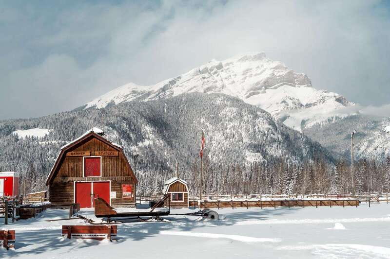 Banff: Family Friendly Horse-Drawn Sleigh Ride - Arriving at the big red stables on Sundance Road