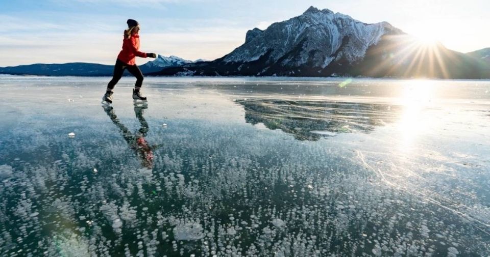 Banff: Icefields Parkway & Abraham Lake Ice Bubbles Tour - Abraham Lake ice bubbles: skate or walk across the frozen show