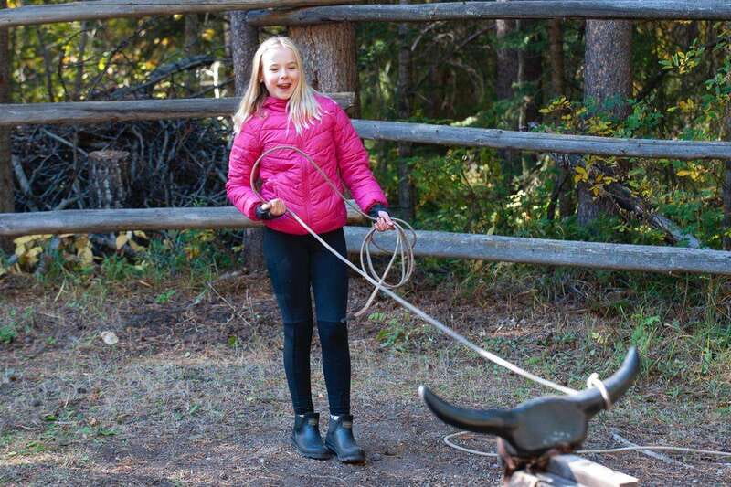 Banff: Wagon Ride with Cowboy Cookout BBQ - Roping practice and horseshoes: what you do besides eat