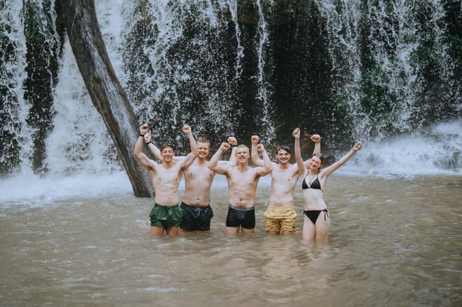 Chiang Mai: 2-Day Tour with Rafting, Elephants, and Waterfall - Waterfall trekking to the finish: breaks, rests, and one more snack stop