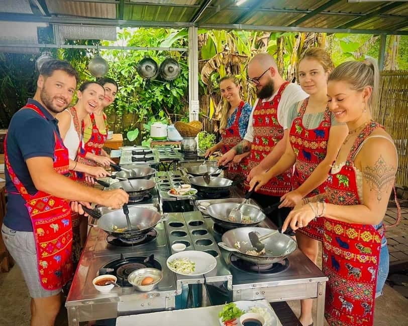 Chiang Mai: Cooking Class, Market and Thai Herbs Garden Tour - Eating in Thai tradition: garden dining, full plates, real satisfaction