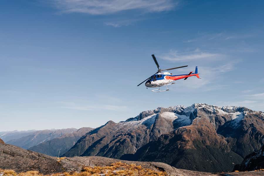 Milford Sound: 1.5-Hour Helicopter Tour with Two Landings - Remote Alpine Landing and Photo Stops: Snow-Country Thrill