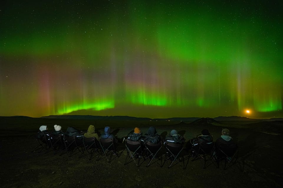 Reykjavik: Northern Lights Tour with Private Photographer - Warm winter jumpsuits and outdoor chairs: the comfort that changes everything